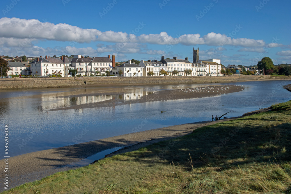 Riverside of the town of Barnstaple overlooking the River Taw in North Devon with spire of Holy Trinity church