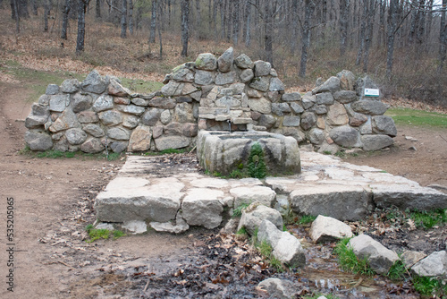 Stone fountain in the Cercedilla field photo