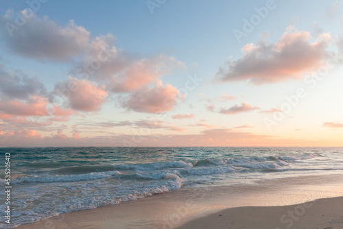 Coastal Dominican landscape with an empty sandy beach © evannovostro