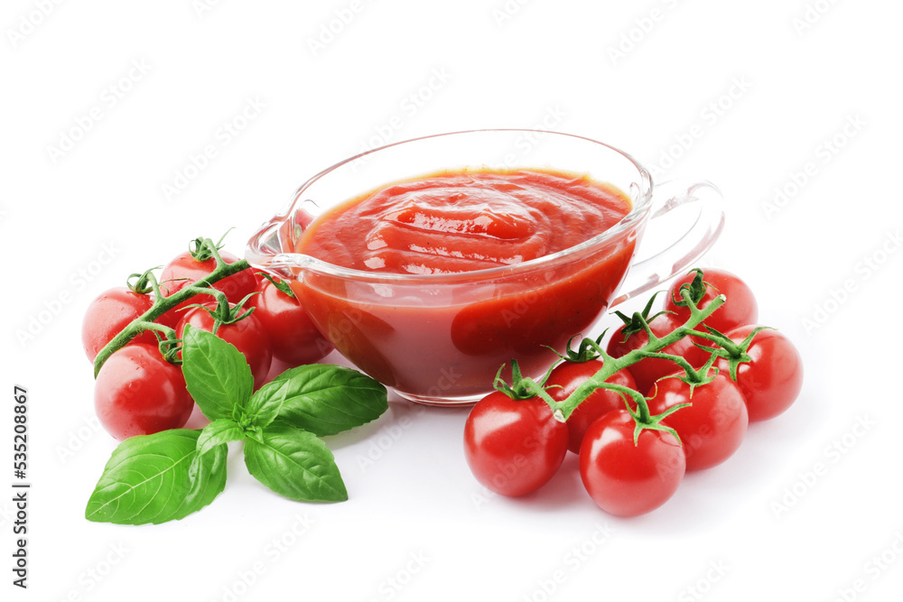 composition of Tomato sauce in a gravy boat with fresh tomatoes and basil isolated on white background. composition of Tomato sauce in a gravy boat with fresh tomatoes and basil isolated on white background.