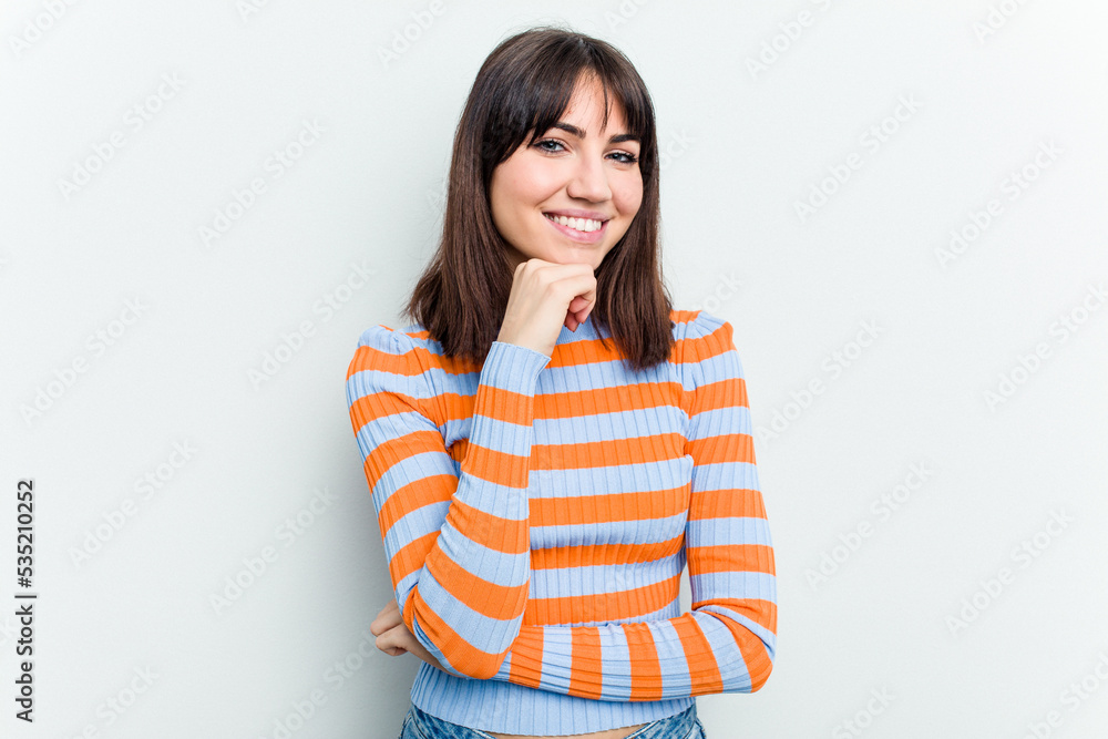 Young caucasian woman isolated on white background smiling happy and confident, touching chin with hand. Young caucasian woman isolated on white background smiling happy and confident, touching chin with hand.