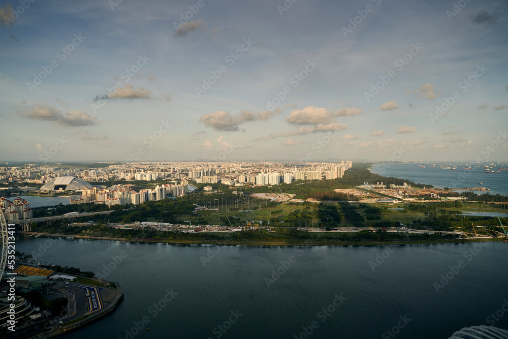 Obraz premium Aerial view of Singapore Marina Bay area with its financial and tourism district, including its latest Marina Bay Sands