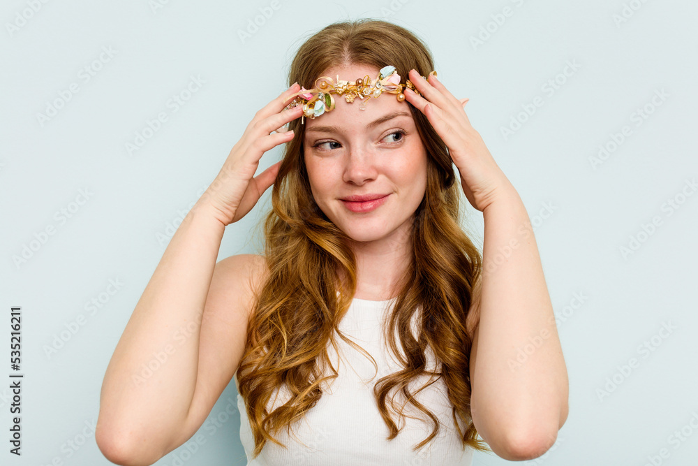 Young elf woman isolated on blue background Young elf woman isolated on blue background