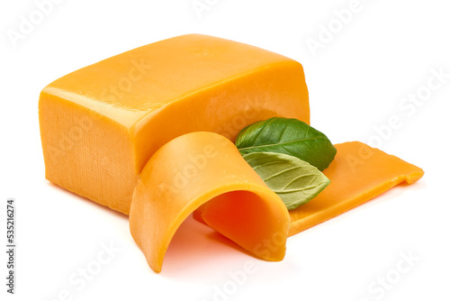 Piece of Cheddar cheese, isolated on white background. High resolution image.