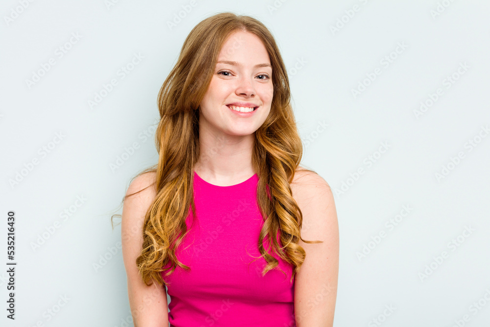 Portrait of pretty young caucasian woman isolated on blue background Portrait of pretty young caucasian woman isolated on blue background