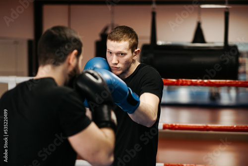 Boxers train in the ring and in the gym © andriyyavor