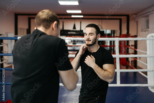 Boxers train in the ring and in the gym