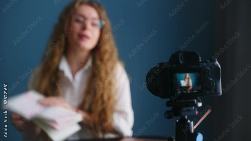 Online teacher live streaming lesson to students. Blogger filming content on camera. Confident woman talking in video chat conference. Female on remote work. Girl recording content. Focus transition. Online teacher live streaming lesson to students. Blogger filming content on camera. Confident woman talking in video chat conference. Female on remote work. Girl recording content. Focus transition.