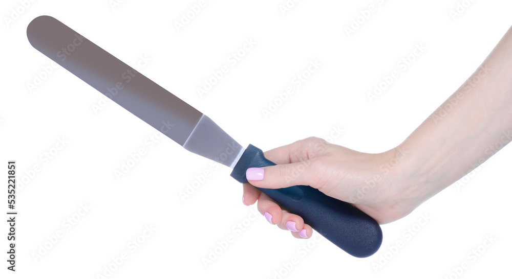 Pastry spatula in hand on white background isolation Pastry spatula in hand on white background isolation