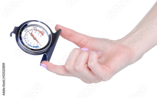 metal thermometer for oven in hand on white background isolation