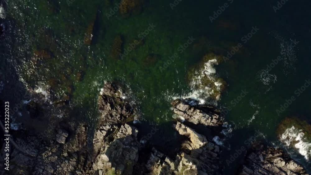 strong waves hitting the rocks strong waves hitting the rocks