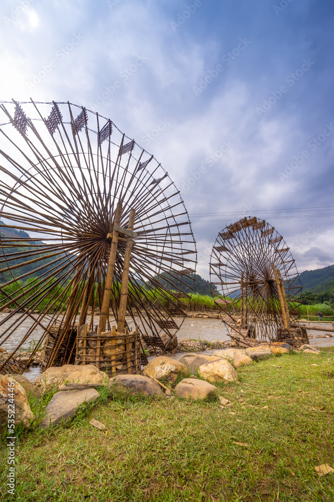 Fototapeta premium view of Water mill in Mu Cang Chai, Yen Bai province, Vietnam in a summer day