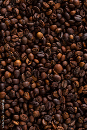 High roast coffee beans structured and textured background