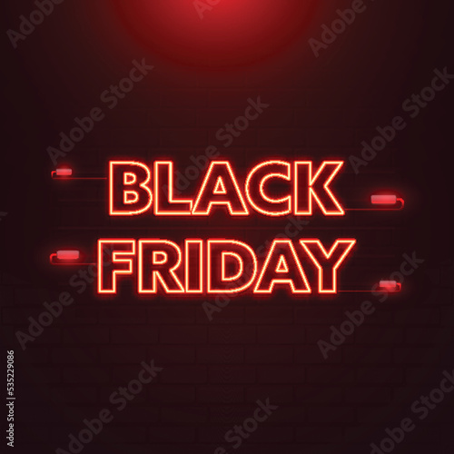 Neon Black Friday Font Against Dark Red Brick Wall Background.