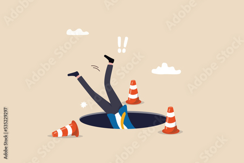 Failure or mistake causing catastrophe despair, problem or risk from crisis or recession, danger or business accident, trouble, loss or pitfall concept, terrified businessman fall down into the hole.