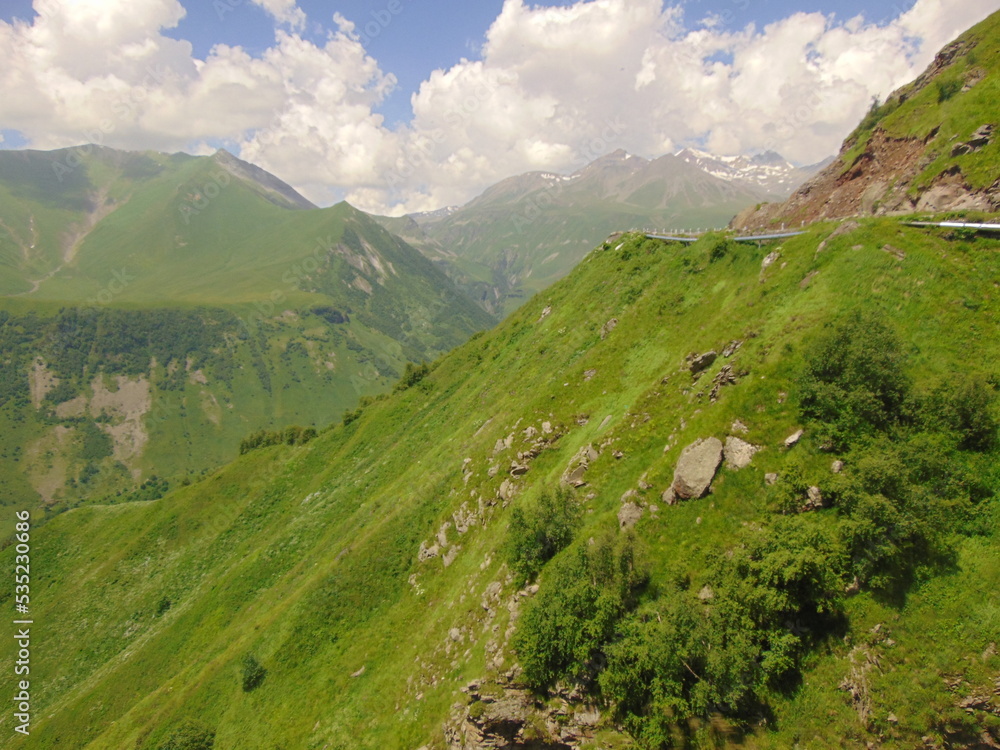 Naklejka premium mountain landscape with mountains and clouds