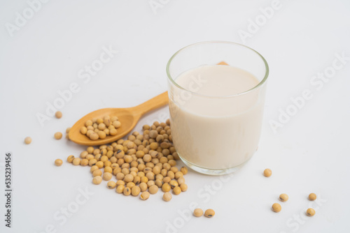 Health Benefits of Soy Milk,Soy milk in glass and soya bean isolated on white background