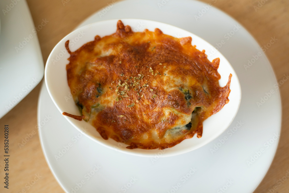 Baked Spinach with Cheese in white Baked Spinach with Cheese in white