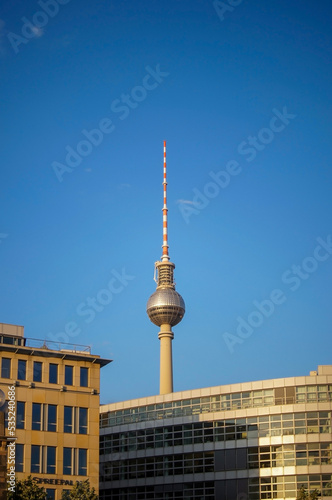 Berlin's Alexanderplatz, Weltzeituhr World Time Clock yellow tram and TV Tower. Alexanderplatz