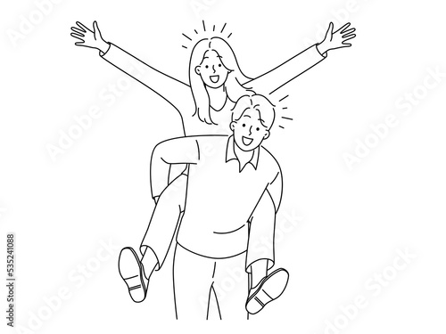 Happy woman piggyback smiling man 