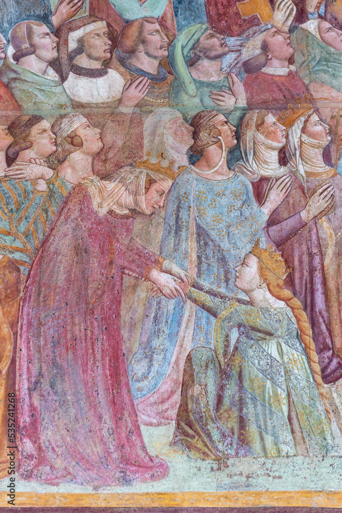 Detail of medieval fresco showing princess kneeling before queen in the medieval court of Pisa