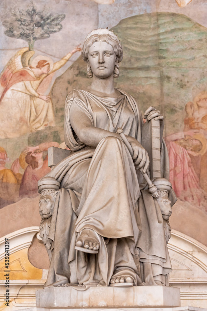Marble statue of roman goddess inside church in Pisa