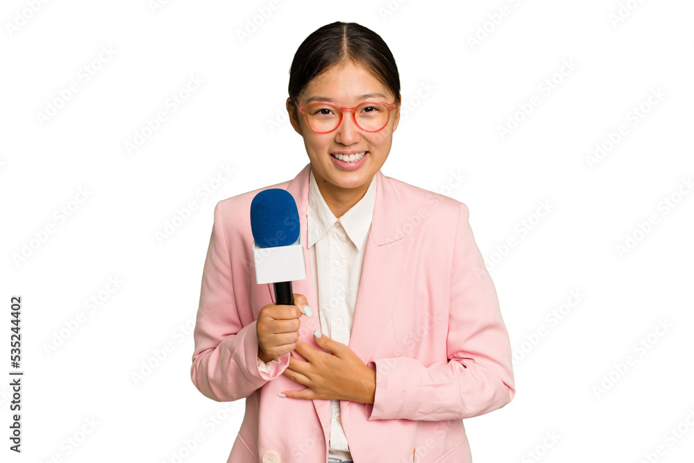 Young TV Asian presenter isolated on green chroma background laughing and having fun. Young TV Asian presenter isolated on green chroma background laughing and having fun.