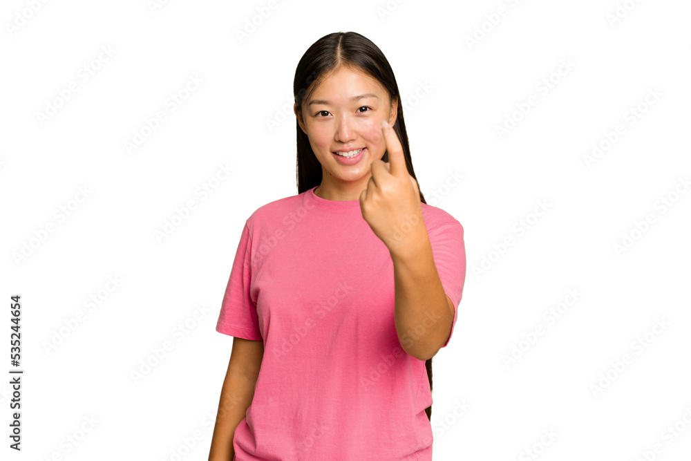Young Asian woman isolated on green chroma background pointing with finger at you as if inviting come closer. Young Asian woman isolated on green chroma background pointing with finger at you as if inviting come closer.