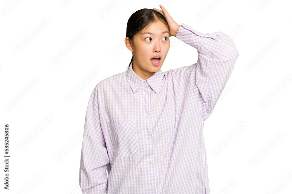 Young Asian woman isolated on green chroma background being shocked, she has remembered important meeting. Young Asian woman isolated on green chroma background being shocked, she has remembered important meeting.