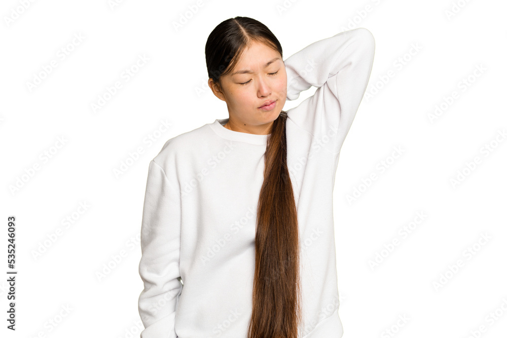 Young Asian woman isolated on green chroma background massaging elbow, suffering after a bad movement. Young Asian woman isolated on green chroma background massaging elbow, suffering after a bad movement.