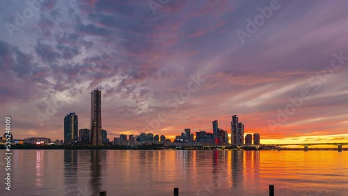 Beautiful Sky Sunset over the han river near the shore. 63 building, at Yeouido District in Seoul City, South Korea. (zoom in)