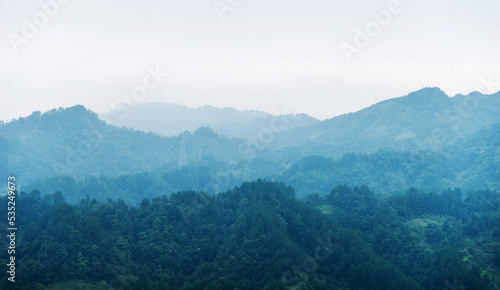 Foggy morning in mountain range © xy