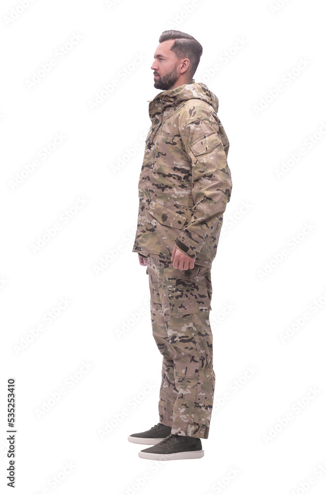 in full growth. a man in autumn camouflage . isolated on white in full growth. a man in autumn camouflage . isolated on white