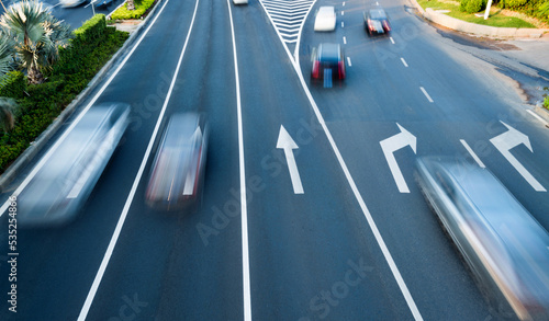 Foto Motion blur of car traffic on the road