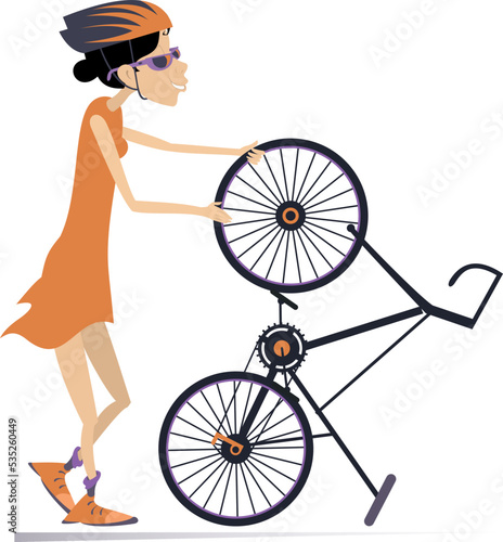 Cyclist and a broken bicycle. Sportsperson repairs the bicycle. 
The cyclist woman repairs wheel on the bicycle. Isolated on white background
