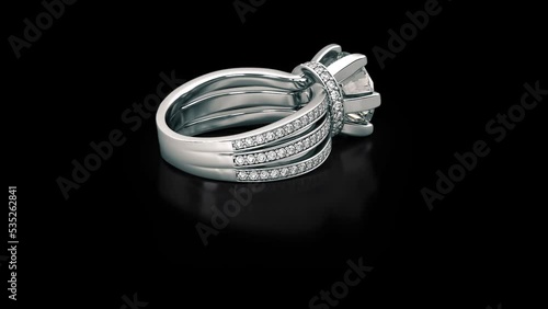 Jewelry engagement white gold ring with diamonds on black. 3D rendering