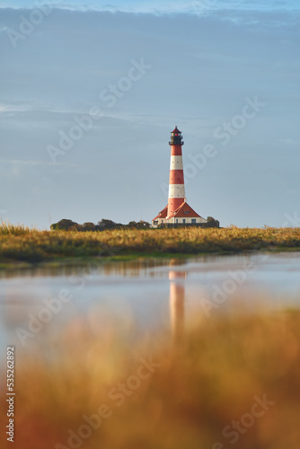 Lighthouse in salt marsh in northern Germany. High quality photo