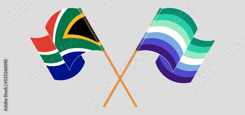 Crossed and waving flags of South Africa and gay men pride
