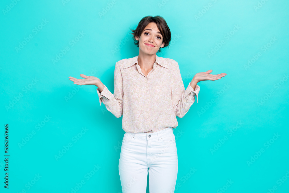 Photo of pretty cute lady wear stylish trendy outfit raise arm palm grimace cant help you excuse me isolated on cyan color background - obrazy, fototapety, plakaty 
