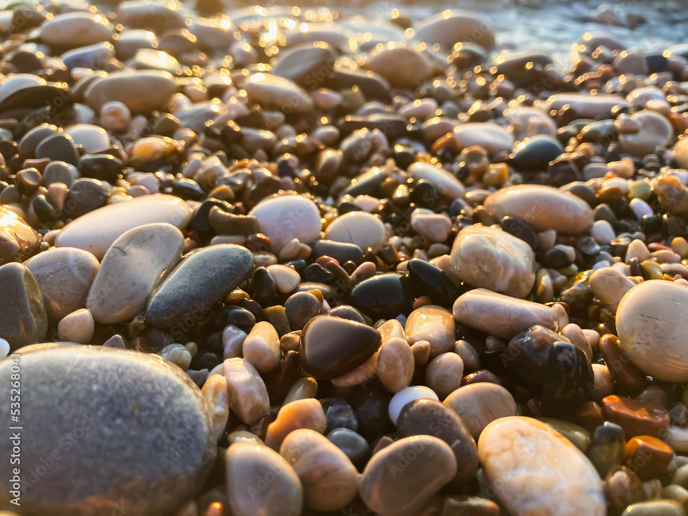 Large and small stones on the beach. Selective focus. Large and small stones on the beach. Selective focus.