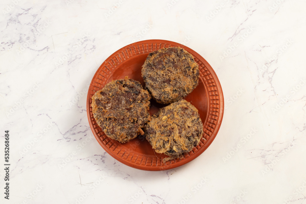 Indian food Jali kabab with tomato sauce served in a dish isolated on background top view Indian food Jali kabab with tomato sauce served in a dish isolated on background top view