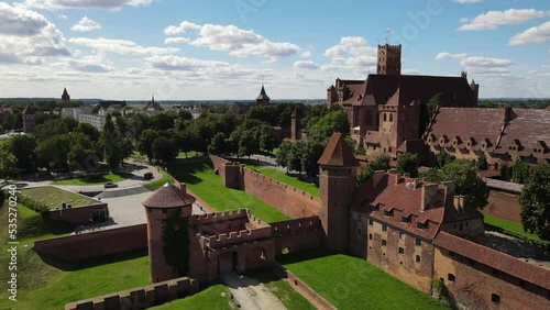 View from the drone at the medieval Teutonic castle in Malbork on the Nogat River on a sunny ,autumn day. photo