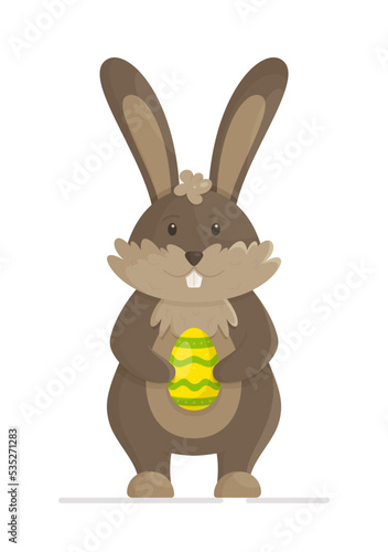 Canvas-taulu Standing rabbit with a ploughshare egg in its paws