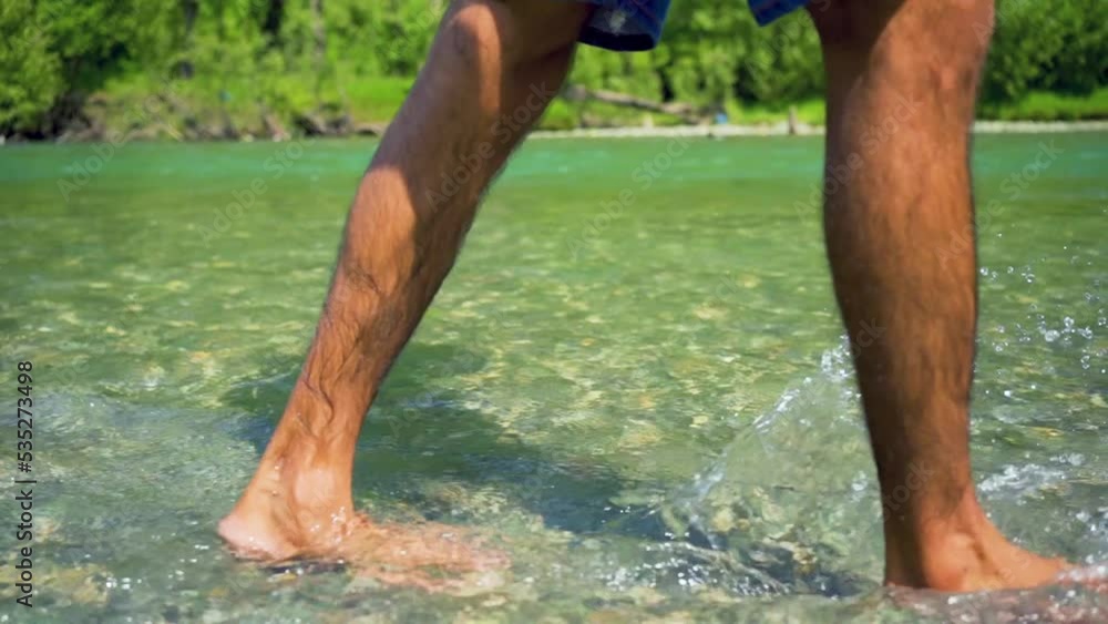 Person Walking in the River, Jammu and Kashmir, India.