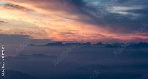 Canadian Mountain Landscape on the West Coast of Pacific Ocean. Dramatic Sunset and Hazy Smoky Sky. St. Mark s Summit near Vancouver  British Columbia  Canada. Nature Background