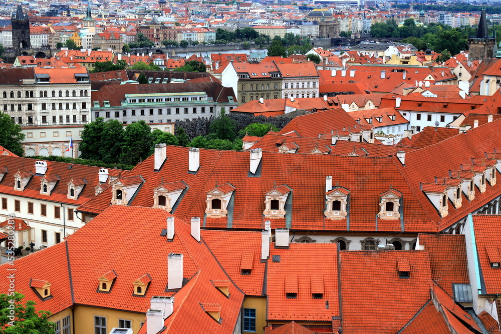 Prague, Czech Republic. Mala Strana, Lesser Town of Praha. Top view, panorama. Ancient old house with red tiled roofs, tower, castle