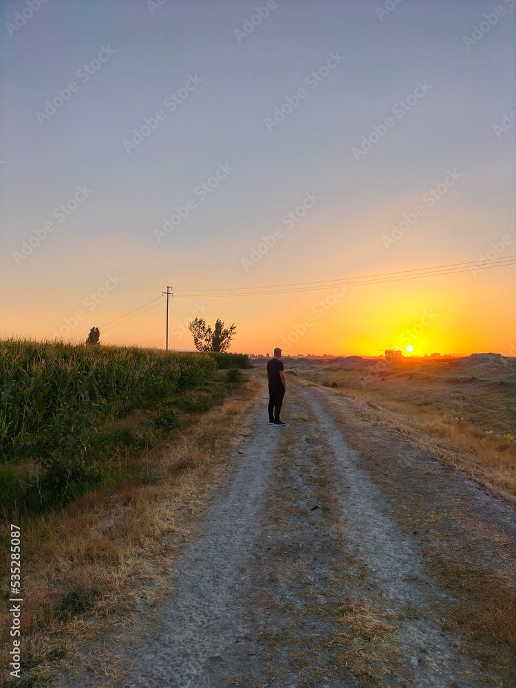 silhouette of a person on the road silhouette of a person on the road
