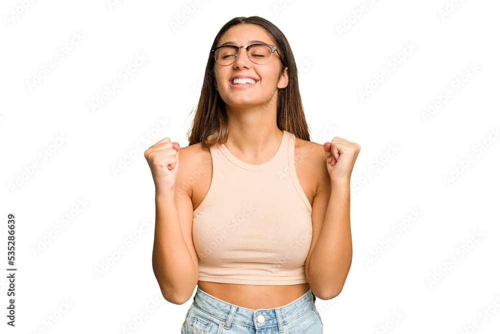 Young Indian woman isolated cutout removal background celebrating a victory, passion and enthusiasm, happy expression. Young Indian woman isolated cutout removal background celebrating a victory, passion and enthusiasm, happy expression.