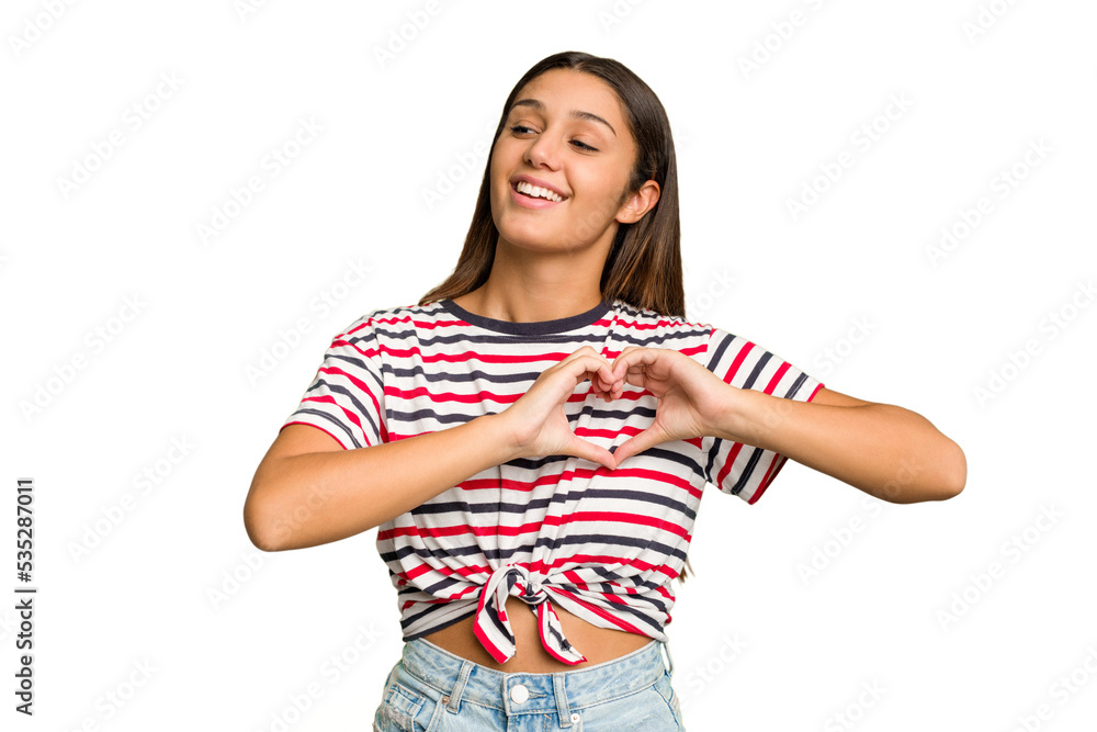 Young Indian woman isolated cutout removal background smiling and showing a heart shape with hands. Young Indian woman isolated cutout removal background smiling and showing a heart shape with hands.
