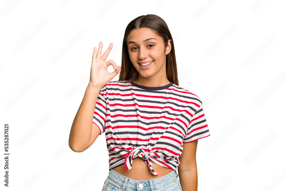 Young Indian woman isolated cutout removal background cheerful and confident showing ok gesture. Young Indian woman isolated cutout removal background cheerful and confident showing ok gesture.